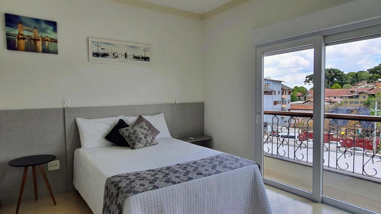 Апартаменты Residencial Dona Virginia Centro Канела Экстерьер фото